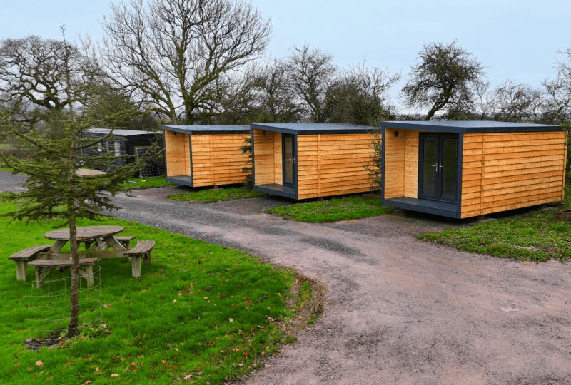 A picture of the glamping pods at Roland Heming's training ground